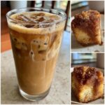 A tall glass of New Orleans iced coffee with ice and cream, next to two slices of cinnamon coffee cake.